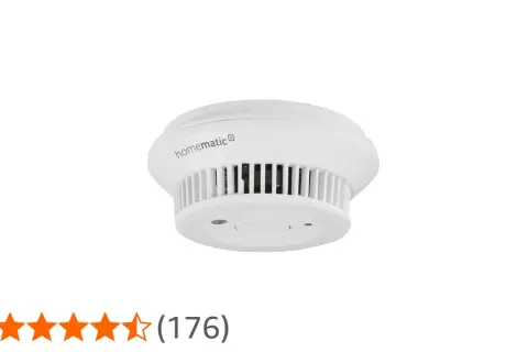 Homematic IP Rauchmelder im Test: Ein weißer, runder Rauchmelder mit Lüftungsschlitzen und einem zentralen Knopf.